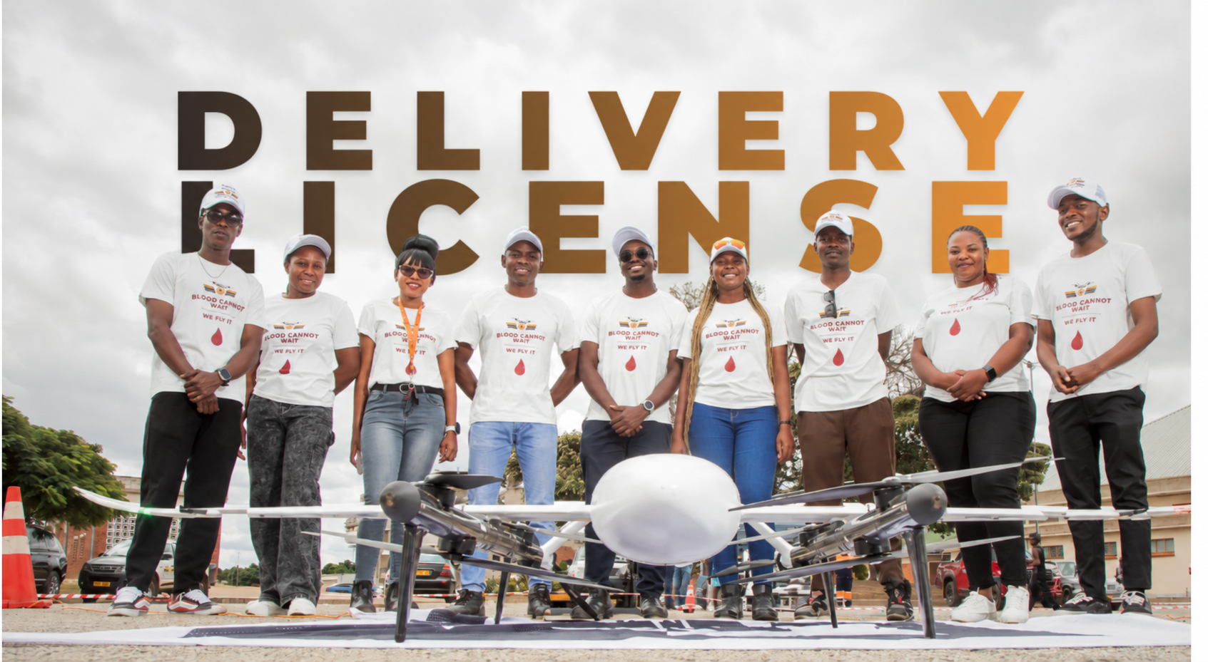 Drone Solutions team with a KITE autonomous delivery drone in Zimbabwe